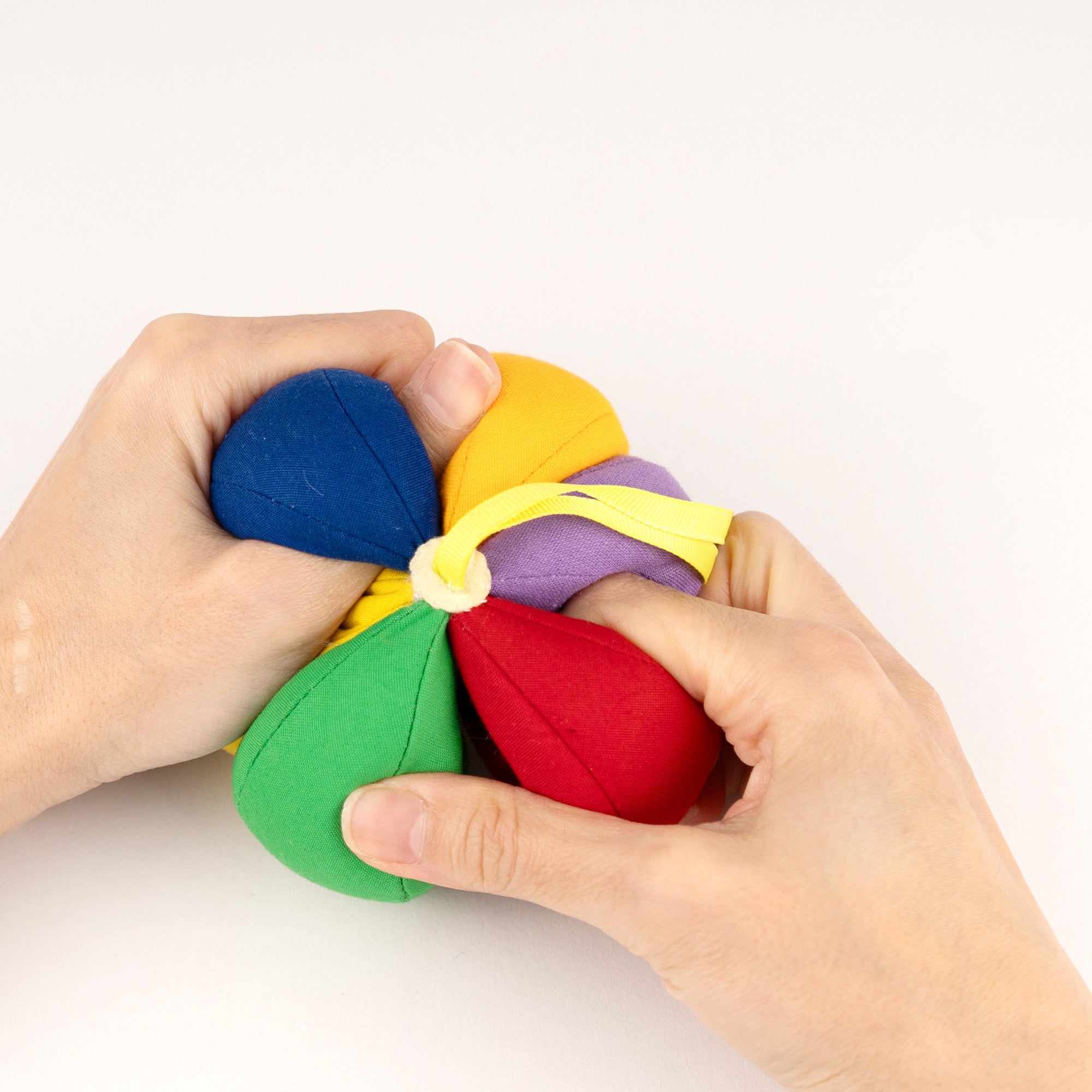 Balle d’éveil sensoriel arc-en-ciel